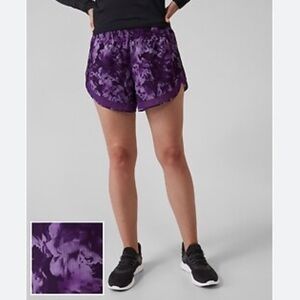 Athleta Mesh Racer Run Mid Rise 4" women’s athletic shorts